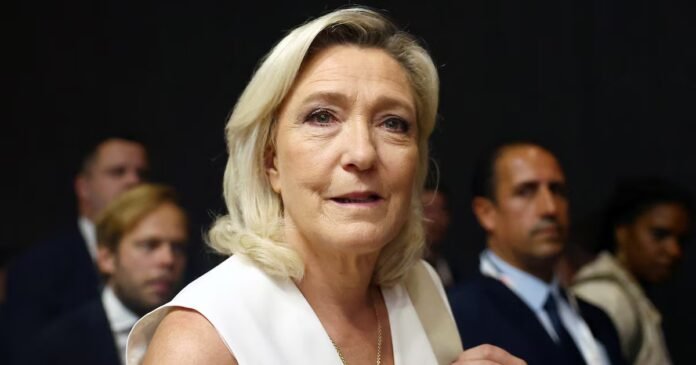 De Marine Le Pen à Bernard Cazeneuve : pourquoi veulent-ils Marine Le Pen, lors d'une visite au salon VivaTech, le 19 juin 2026.
